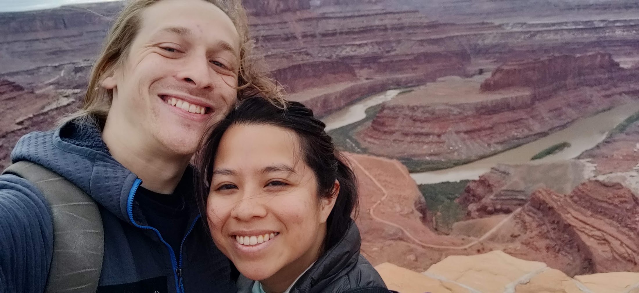 Stephanie and Brandon selfie in front of the Dead Horse State Park bend